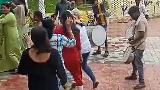 Dancing to Dhol Tasha